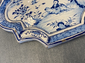 A Dutch Delft blue and white chinoiserie plaque, 18th C.